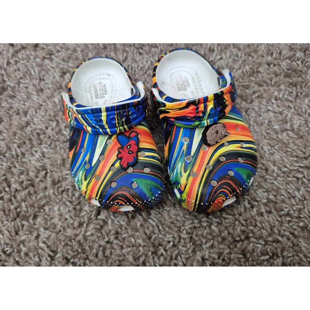 Crocs multicolor size 5c w/ charms